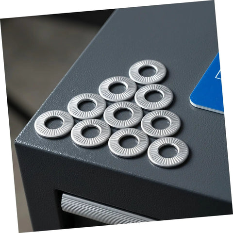 M6 Conical Spring Lock Washers In 304 Stainless Steel Built Tough Industrial Fasteners with high grip serrated edges laying on a metal surface.