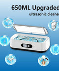 Slick Pro Level Ultrasonic Jewelry Cleaner With 49Khz Deep Wash Power And Five Auto Modes Digital Panel For Glasses Rings Watches And Dental Gear Featuring Beefy Stainless Steel Tank For Zero Drama Fresh Sparkle On Command in a 650ml basin with cleaning solutions.