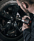 Heavy Duty Half Inch Drive Pneumatic Air Impact Wrench Delivers Over 1100 Ft Lbs Of Bone Crushing Torque used for tire changing.