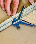 Dead Nuts Accurate 4 Piece Combination Square Set With 12 Inch Carbon Steel Blade Cast Iron Head used for marking on wood.