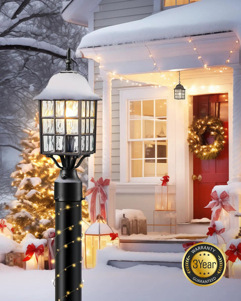 Outdoor Dusk To Dawn Post Light With A 3 Inch Pier Mount Base 19 Inch Tall Exterior Lantern next to decorated porch in winter