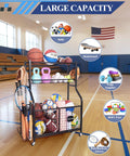 Heavy Duty Rolling Sports Equipment Organizer Rack with Wheels for Garage and Home Gym in a gym holding various sports items.