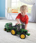 Child playing with Big Farm Tractor And Baler Toy Set 1 16 Scale For Kids Ages 3 And Up With Realistic Lights And Sounds Durable Plastic