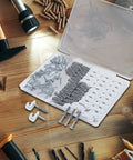 24 Pack White Wire Shelf Clips With Brackets Set for closet shelving, includes screws and expansion tubes, shown in storage box on workbench