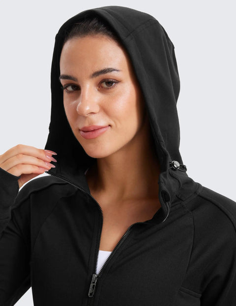 Woman in Cozy Womens Fleece Full Zip Hoodie With Thumb Holes Black Hip Length Go To Casual Sweatshirt Jacket, hood on.