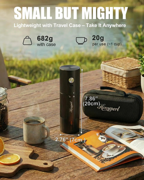 Upgraded High Speed Electric Coffee Grinder With Heavy Duty Stainless Steel Burrs For Quick Perks And Smooth Pour Over Grinds In A Durable Matte Black Build Made For Hustle Ready Mornings on a table with coffee and travel case.