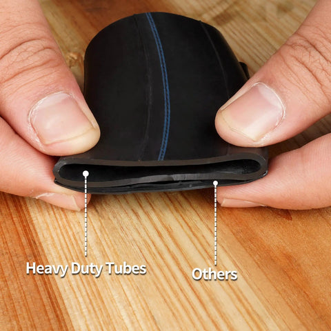 Comparison showing thickness of a heavy-duty 3.00 8 inner tube with TR87 angled stem for wheelbarrows and other thin tubes.