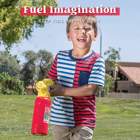 Child playing with Automatic Bubble Blower Fire Extinguisher Style Bubble Machine outdoors