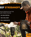 Hearty Beef Stroganoff Freeze Dried Backpacking Meal Just Add Water, prepared outdoors with Jetboil stove in nature.