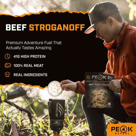 Hearty Beef Stroganoff Freeze Dried Backpacking Meal Just Add Water, prepared outdoors with Jetboil stove in nature.