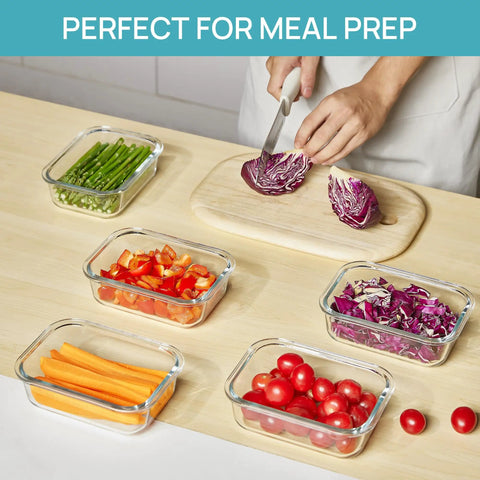 5 Pack 22oz Glass Meal Prep Containers with Snap Airtight Lids filled with fresh vegetables on a kitchen counter