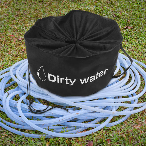 RV Hose And Water Tube Storage Bag Big Capacity Organizer with "Dirty Water" print, lying on coiled blue hoses on grass.