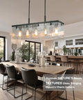 Textured Glass Chandelier With Water Ripple Panels For Dining Room And Kitchen Island hanging over dining table.