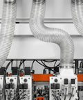 Industrial setup with 30 Ft Long 6 Inch PVC Dust Collection Hose Flexible Puncture Resistant Vacuum Hose With 8 Stainless Steel Clamps