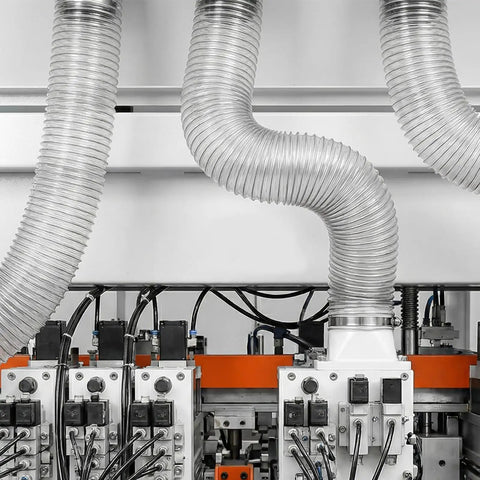 Industrial setup with 30 Ft Long 6 Inch PVC Dust Collection Hose Flexible Puncture Resistant Vacuum Hose With 8 Stainless Steel Clamps