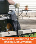 Tow Behind Lawn Dethatcher 48 Inch Wide With 24 Durable Spring Steel Tines attached to lawn tractor, transport handle visible