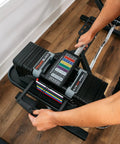 Person using PowerBlock Elite EXP with Straight Bar For Adjustable Dumbbells Converts Your Elite EXP Sets Into A Legit Barbell For Home Gym Workouts, Easy Clamp On Ends, Versatile Weightlifting, Curling, Presses, Rows, And Strength Training