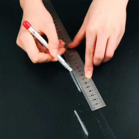 Person using Two Pro Grade Soapstone Marker Pencil Sets With 12 Refills For Welding, Metalworking And Fabrication on metal surface