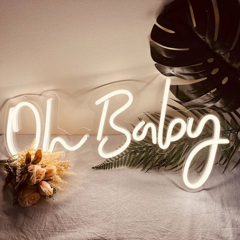 Oh Baby Neon Sign White LED Wall Decor with Dimmable Brightness and Plug In Power Adapter, floral and leaf background, nursery use.