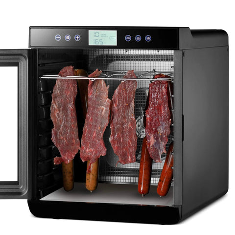 Kickass Food Dehydrator With Fifteen Extra Large Stainless Trays For Making Badass Beef Jerky And Crispy Dog Treats showing jerky and sausages in interior.
