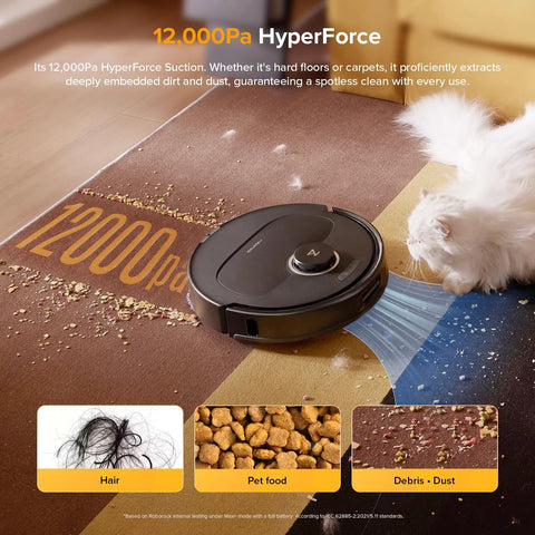 Roborock Qrevo S5V robot vacuum and mop, black circular unit with 12,000Pa HyperForce label on floor beside a white cat.