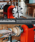 Heavy Duty Wood Lathe Chuck With Self Centering Scroll Jaw System showing 5" flat jaws re-shaping bowl bottoms during woodturning.