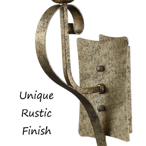 Close-up of Rustic Wall Sconce Vanity Light with amber glow glass shade and rubbed bronze finish, showing unique rustic metal texture.
