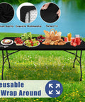 Elastic Fitted 6 Foot Rectangle Tablecloth 2 Pack No Slip Wraparound Edges For Outdoor Parties And Picnics Stretch Washable Polyester Spandex Cover In Black 30x72 Inches displayed on table outdoors with food