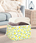 Heavy Duty Foldable Storage Bin With Secure Snap Lid And Wide Grip Handles For Bedroom Closet Organization Zero Clutter Space Saving Collapsible Fabric Container holding rolled blankets in a cozy living room.