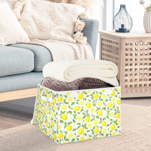 Heavy Duty Foldable Storage Bin With Secure Snap Lid And Wide Grip Handles For Bedroom Closet Organization Zero Clutter Space Saving Collapsible Fabric Container holding rolled blankets in a cozy living room.