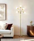 Lit Five Head LED Floor Lamp for Living Rooms and Offices, brass standing lamp with adjustable shades, near sofa in modern room.