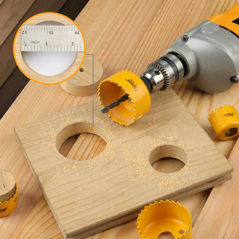 Close-up of Six Piece Hole Saw Set With Arbor Adapter Makes Short Work Of Wood Metal Plastic Drywall Cutter Kit in use on wood.