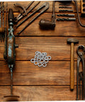 Built Tough Manganese Steel Wedge Locking Washers Heavy Duty Anti Loosening Hardware For Machinery And Construction Vibration Resistant on workbench.