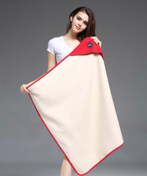 Woman holding Organic Cotton EMF Protection Baby Blanket With Silver Shielding 5G Blocking Belly Shield For Pregnancy Moms