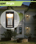 Solar Outdoor Wall Lights With Motion Sensor And Dusk To Dawn Auto On At Night 3 Modes No Wires Needed Waterproof And Anti Rust Exterior Wall Fixture For Garage Front Porch And Yards Two Pack illuminating a house facade with a close-up view of the fixture.
