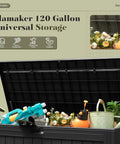 Open 120 Gallon Resin Deck Box Waterproof Outdoor Storage Box showing garden and pool tools, imitation wood look.