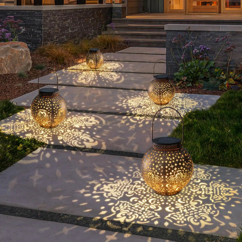 Outdoor Solar Lanterns With Cute Owl Cutouts Two Pack Waterproof Garden Decor illuminating pathway at dusk