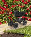 Rolling Garden Stool With Seat And Extendable Handle Tool Cart With Wheels And Extra Storage Knee Friendly Seat For Planting And Weeding Durable Steel Frame In Black in a garden setting