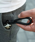 Premium Leather Keychain With Stainless Steel Ring And Extra Key Rings visible in hand, attached to pants pocket.
