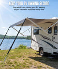 RV with Heavy Duty RV Awning Tie Down Kit With Windproof Design by a lake