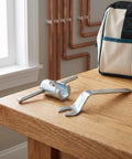 Heavy Duty Pro Fire Sprinkler Head Removal Wrench Two Piece Kit Steel Installation Tool on wooden table with bag.