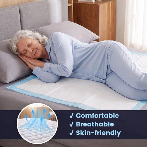 Heavy Duty Disposable Bed Pads Extra Large Underpads 50 Pack Super Absorbent Leak Proof Chux Style Pads For Adults Pets And Elders 30By36 Inch Blue total no sweat solution on a bed with a woman sleeping.
