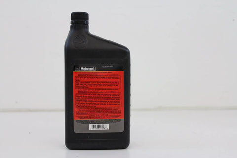Rear view of Ford XT-M5-QS Full Synthetic Manual Transmission Fluid 1 Quart bottle with label details visible.