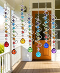 Seven Piece Crystal Gazing Ball Spiral Wind Spinner Suncatchers For Garden Decor, hanging metal and K9 crystal set on a porch