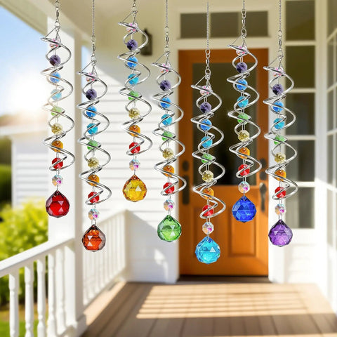 Seven Piece Crystal Gazing Ball Spiral Wind Spinner Suncatchers For Garden Decor, hanging metal and K9 crystal set on a porch