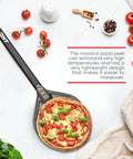 8 Inch Perforated Pizza Peel With Long Handle Aluminum Turning Peel holding a cooked pizza surrounded by fresh ingredients