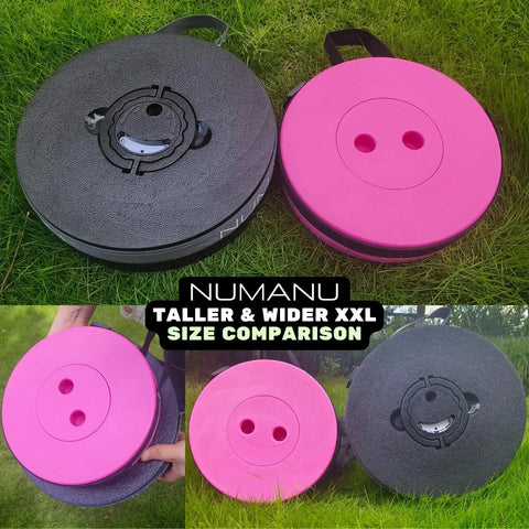 Two Heavy Duty XXL Collapsible Camping Stools in cushioned carry bags, one pink and one black, shown for size comparison on grass.