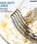 Close-up of Pro Grade Heavy Duty Pastry Blender With Stainless Steel Blades And Wire Dough Cutter blending flour and butter.