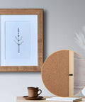Wooden picture frame with cork backing; front view shows botanical print and inset close-up of turn-button fasteners.