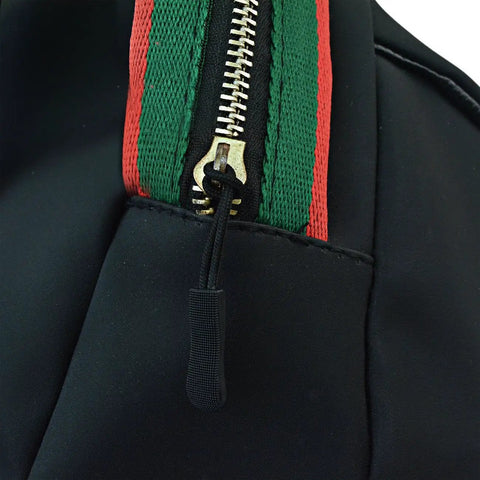 Close-up of Black Nylon Zipper Pulls 10 Pack With Non Slip Gripper Two And A Half Inch Universal Zipper Tabs on coat